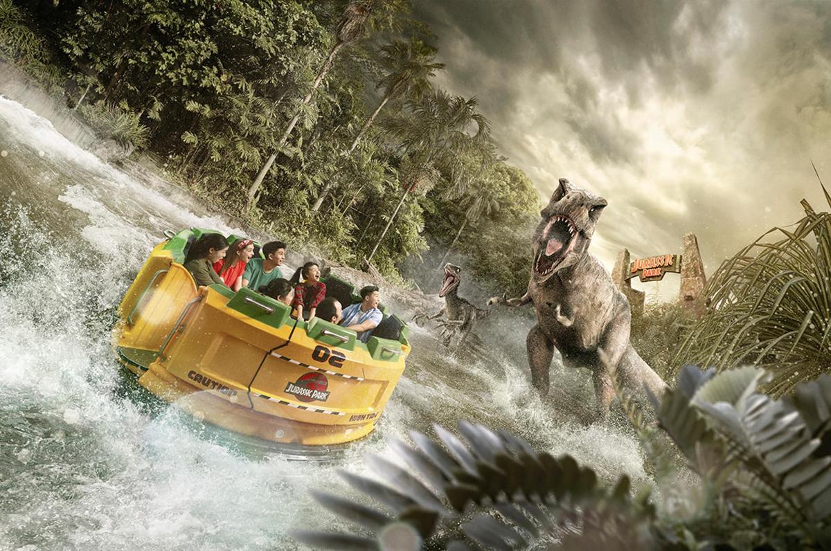 a group of people riding on a ride in a ride in the water