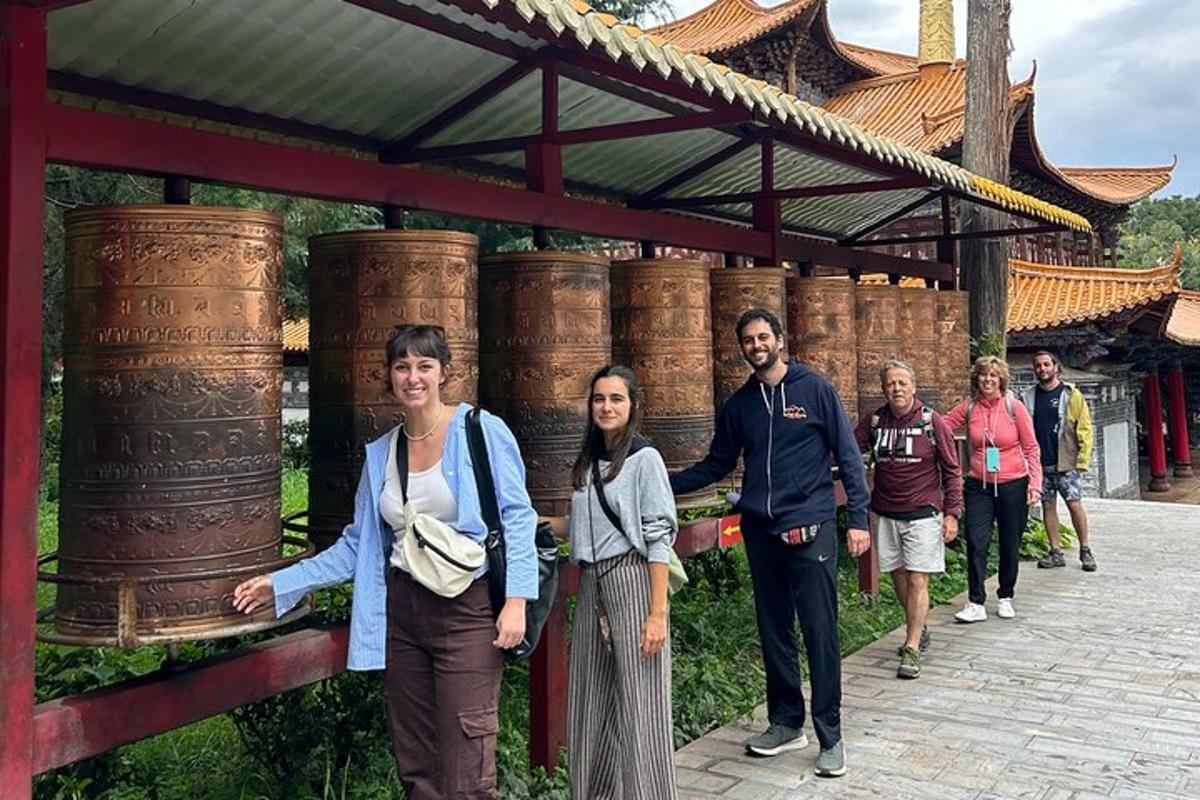 a group of people standing in front of a temple