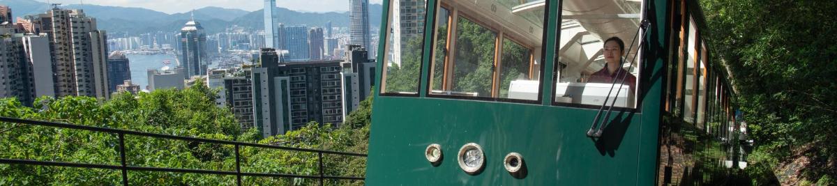 a person is riding a tram in the city