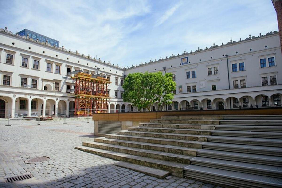 a large building with stairs in front of it