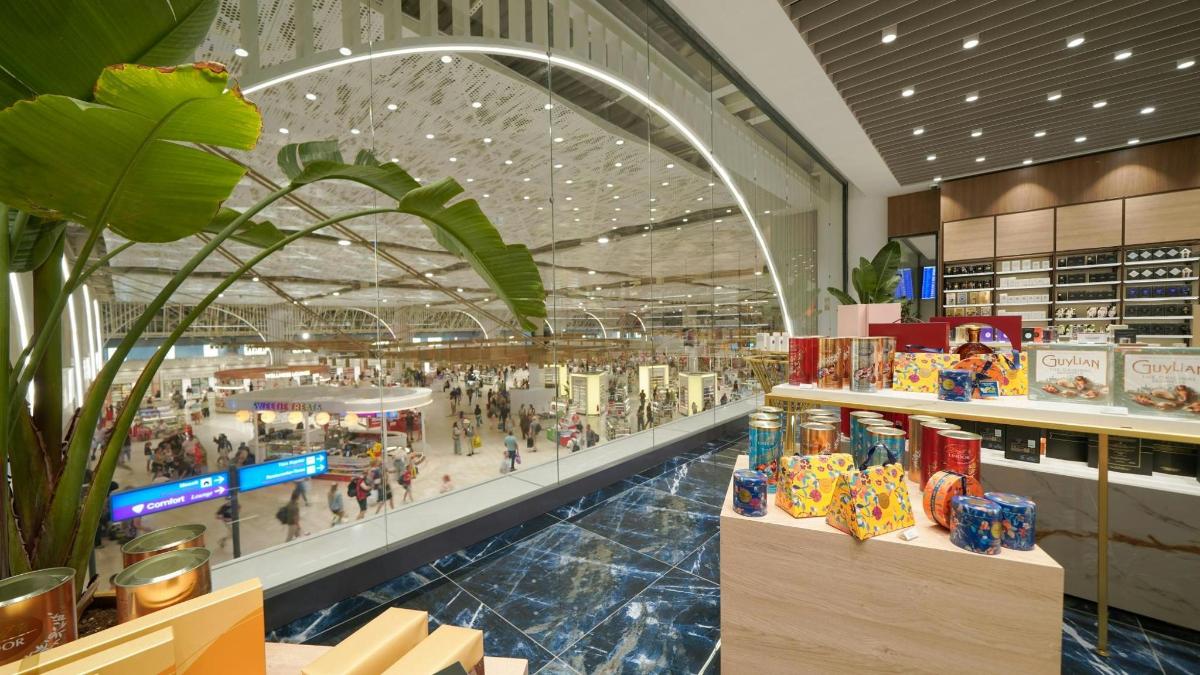 a large shopping mall with people in it