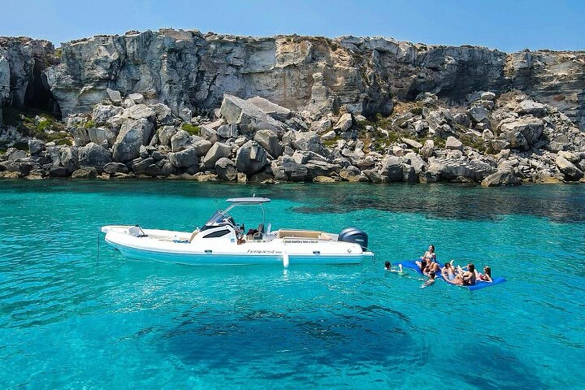 a group of people on a boat in the water