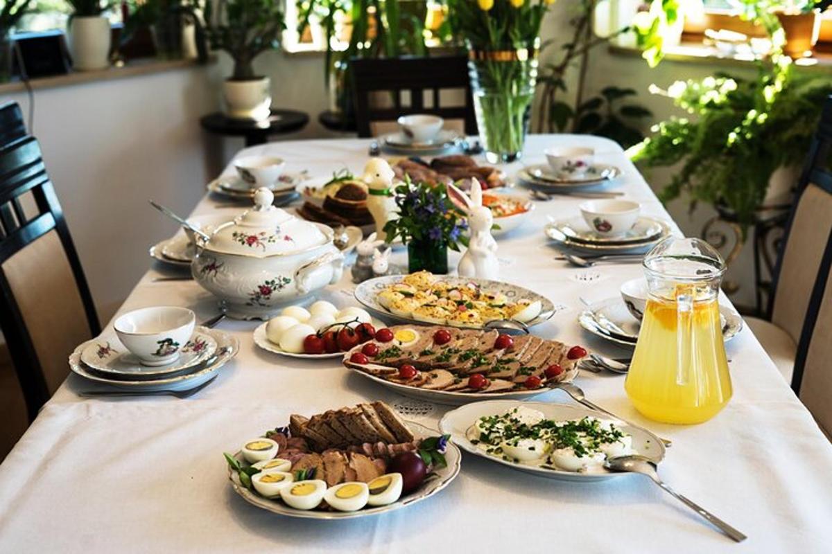 a table with plates of breakfast food on it