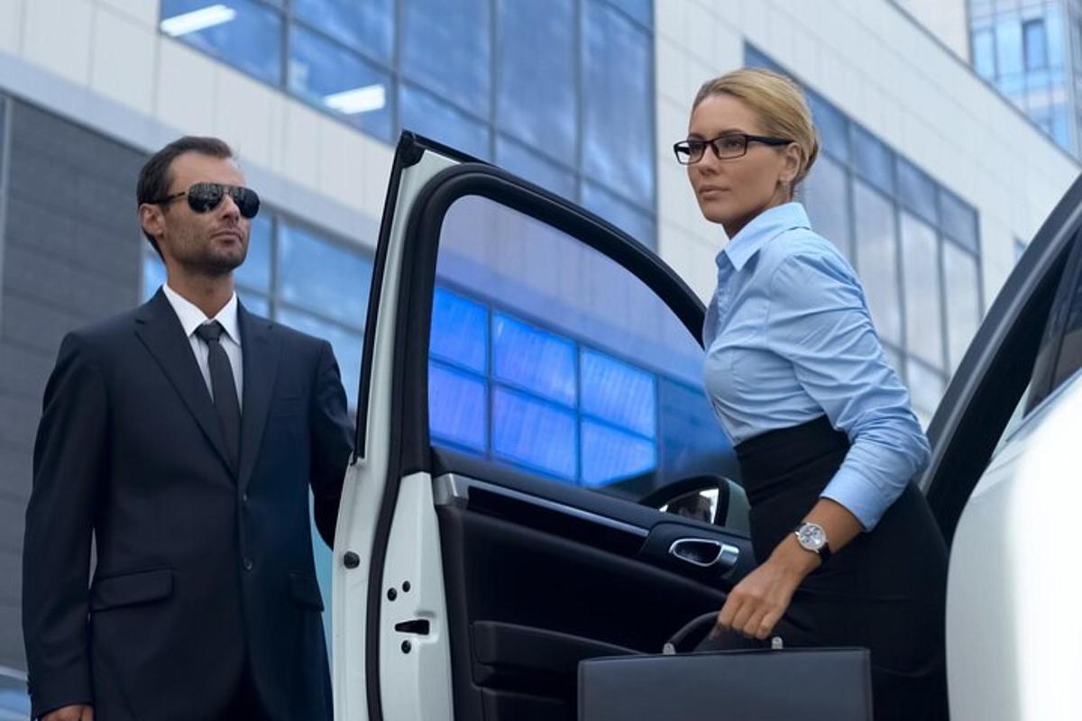 a man and a woman getting out of a car