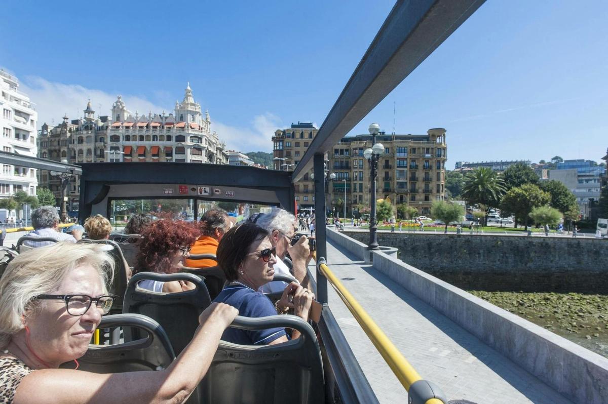 a group of people riding on a bus