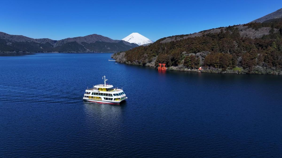 a boat floating on a large body of water