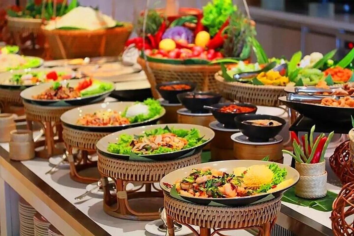 a buffet with many plates of food on a table