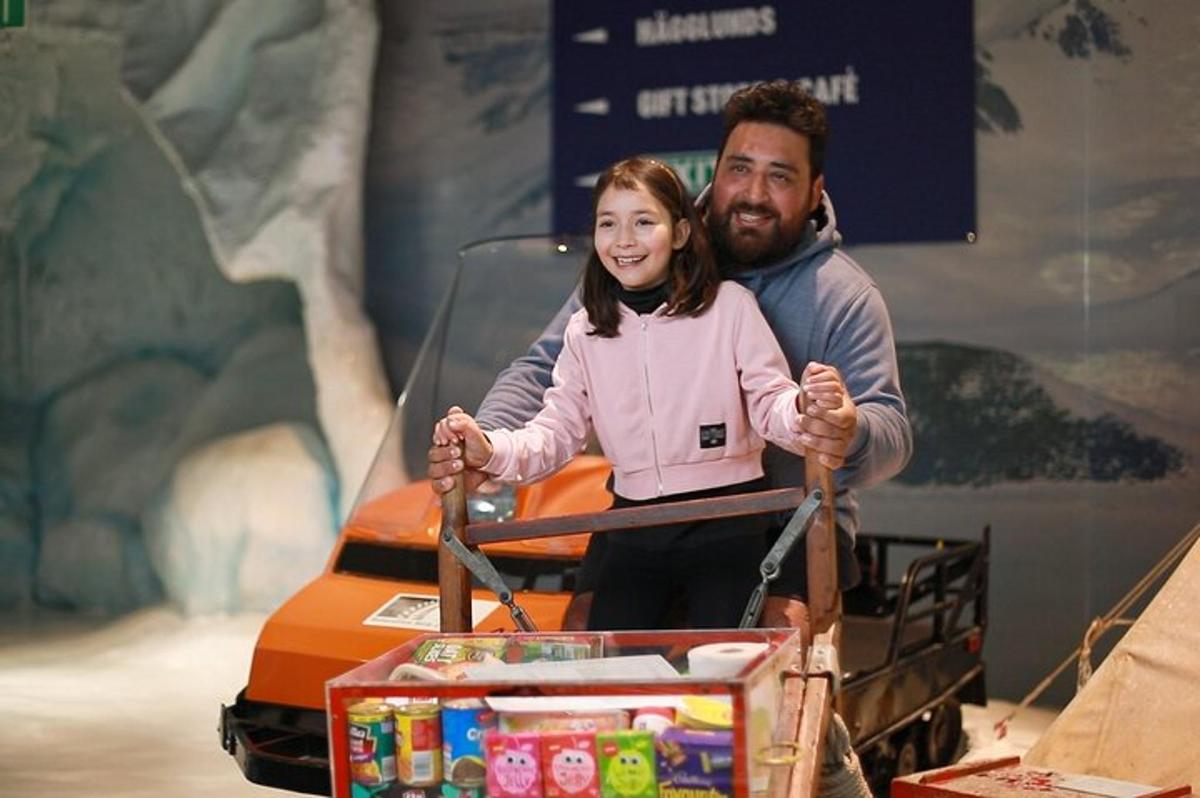 a man and a little girl in a cart