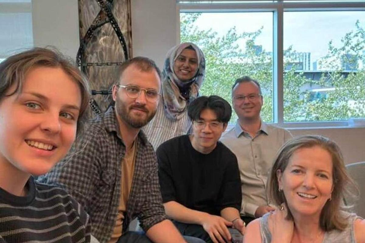 a group of people sitting on a couch