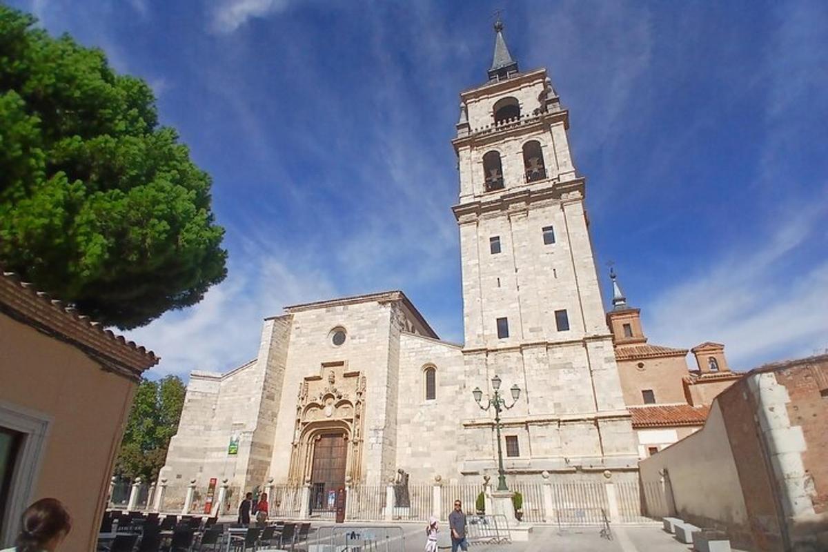 a large stone building with a clock tower