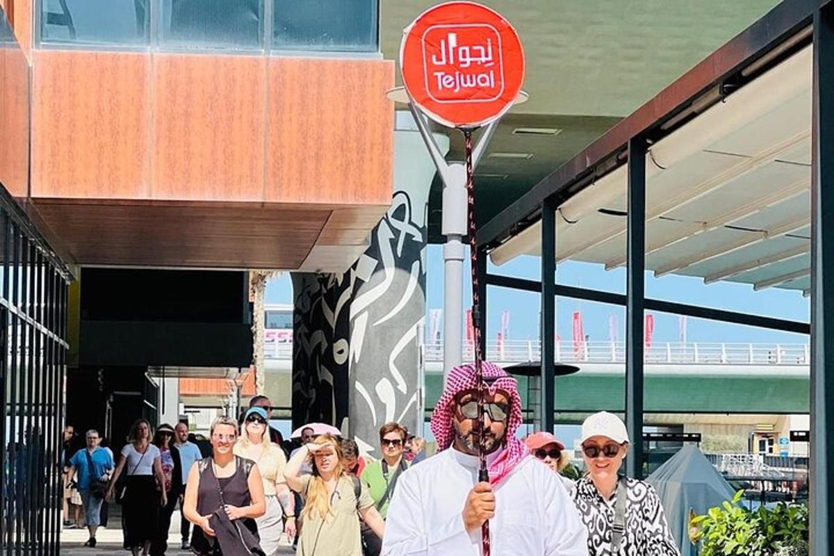 a group of people walking down a street