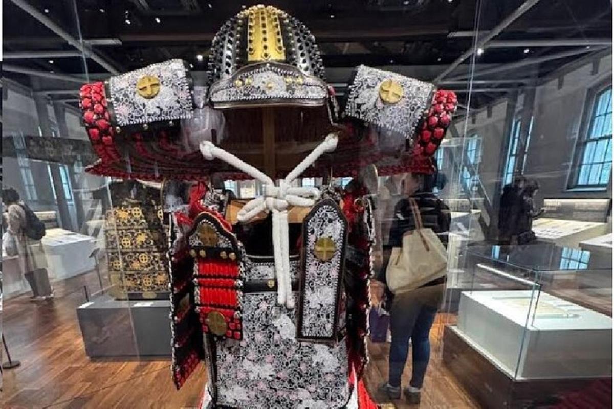 a man in a costume in a museum