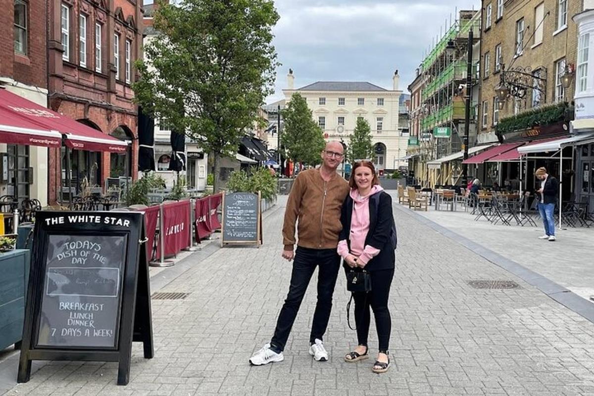 a man and a woman standing on a street