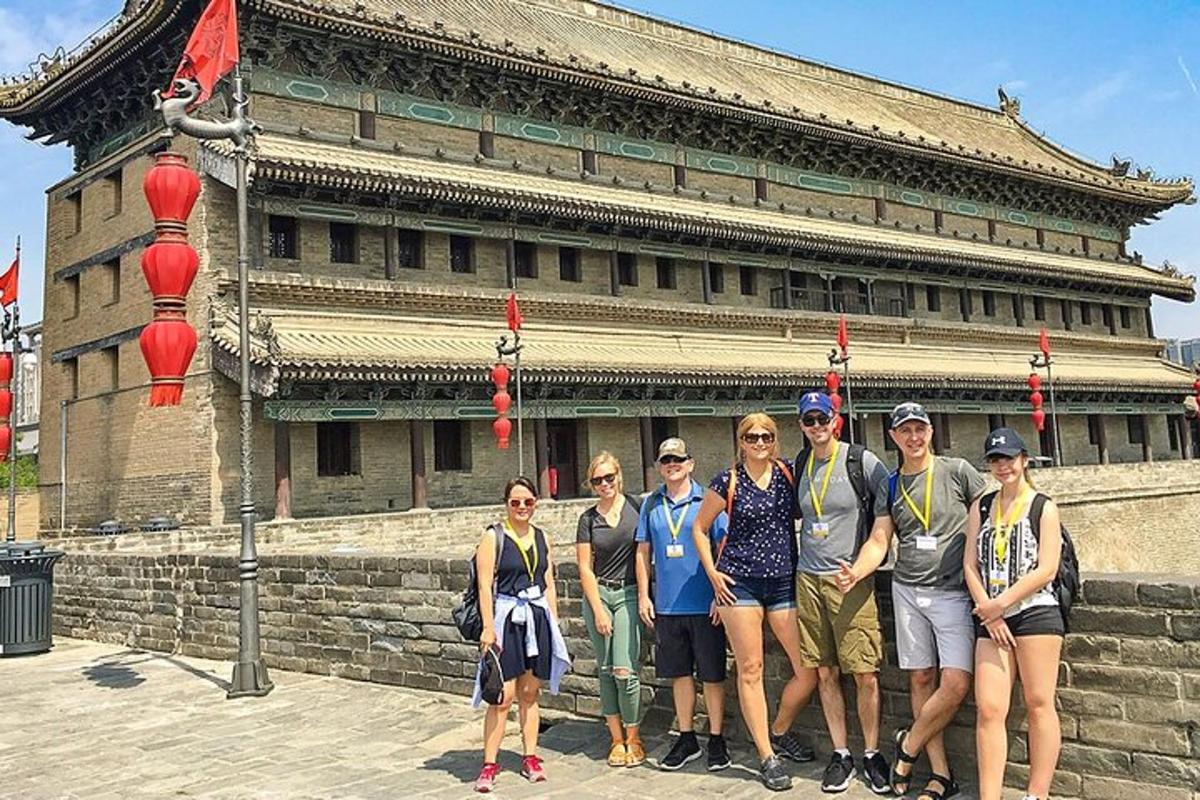 a group of people standing in front of a building