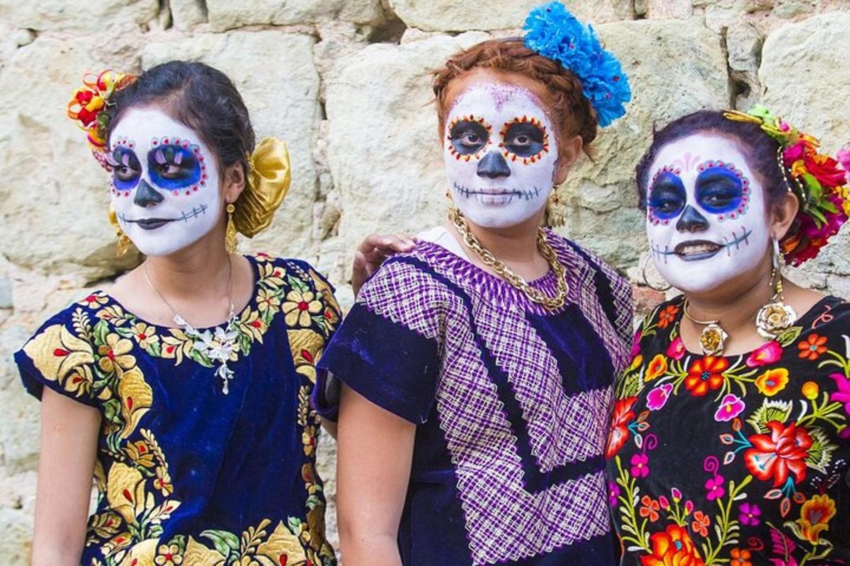 two girls with their face painting of day of the dead