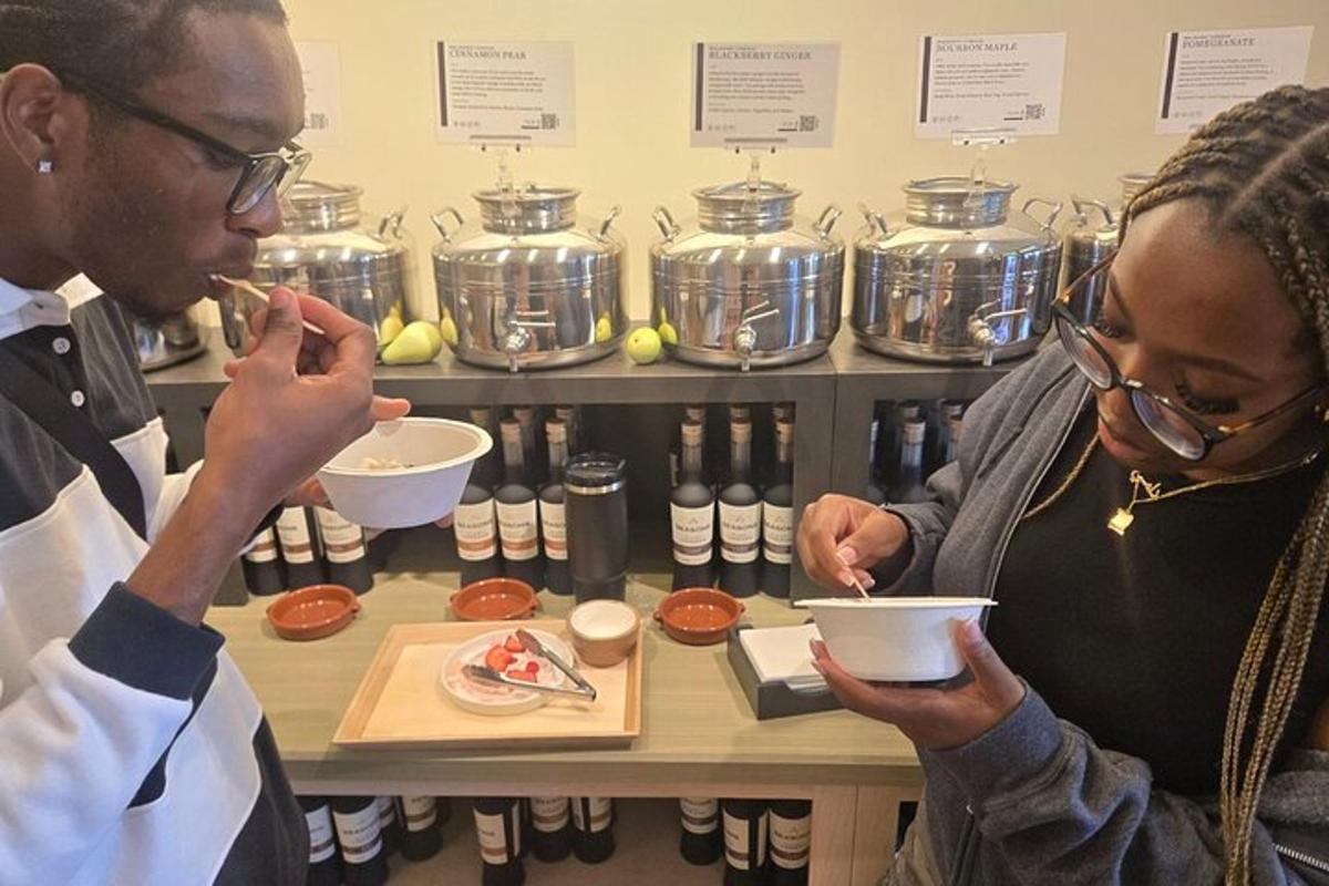 a woman feeding a man a bowl of food