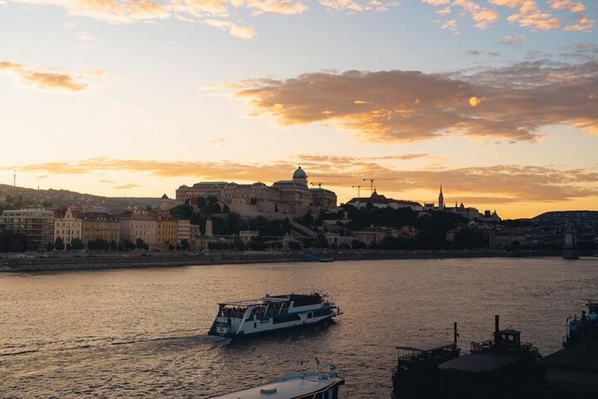 a boat in the water with a city in the background
