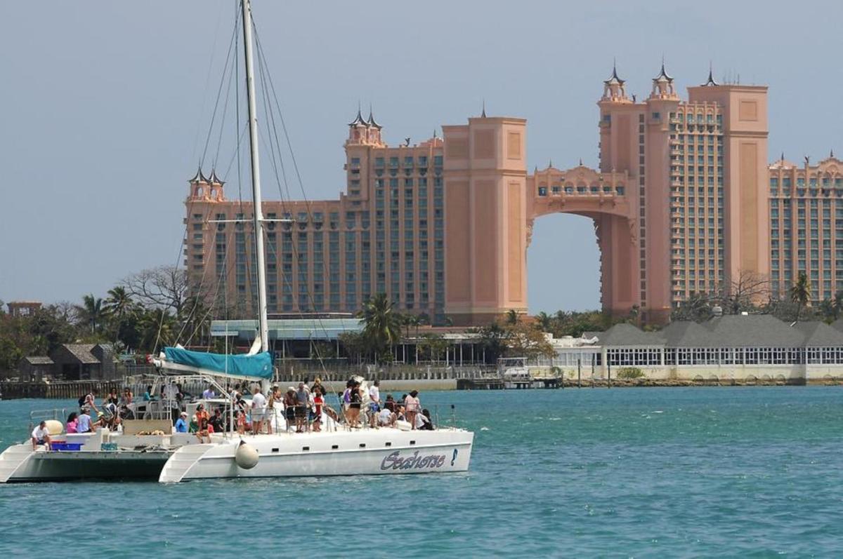 a group of people on a boat in the water