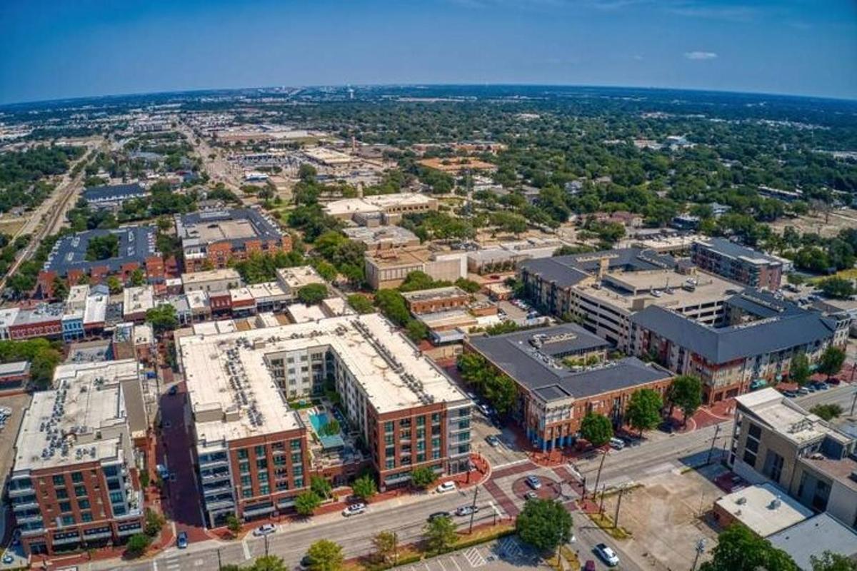 an aerial view of a city with buildings