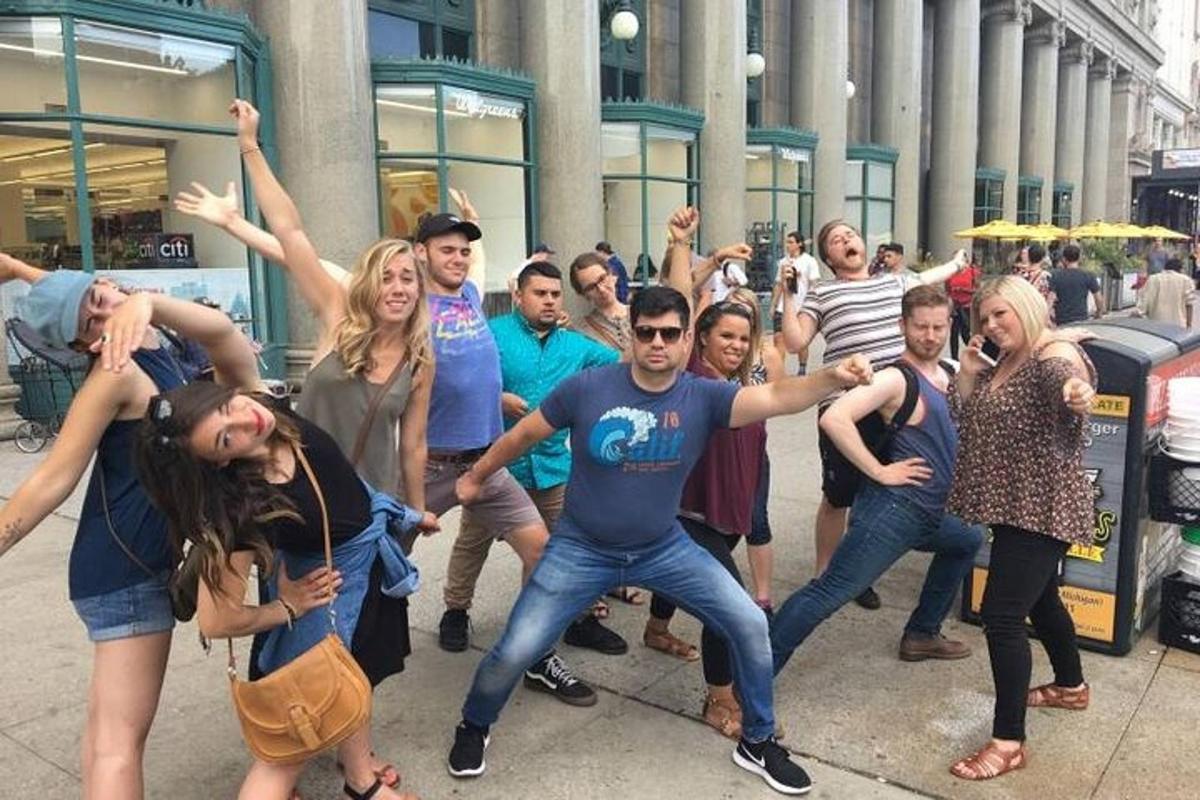 a group of people dancing on a street