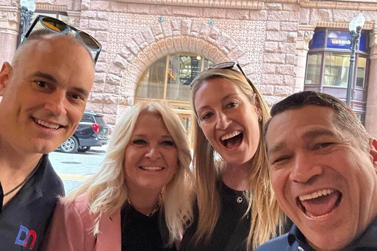 a group of people posing for a picture