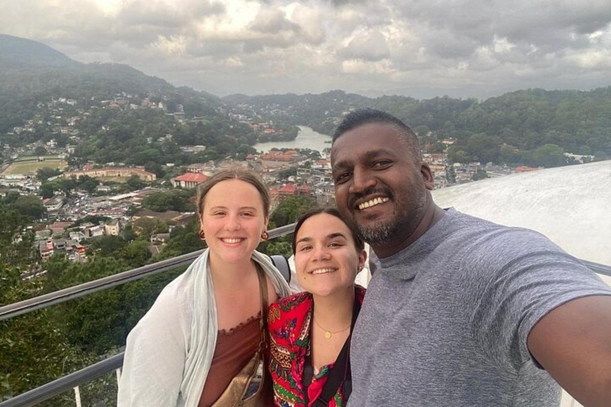 a man and two women posing for a picture