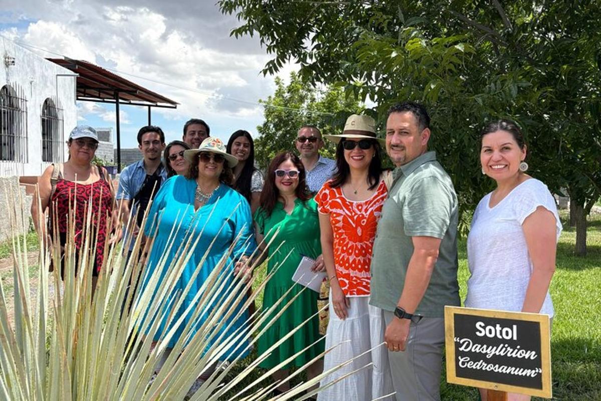 a group of people are posing for a picture