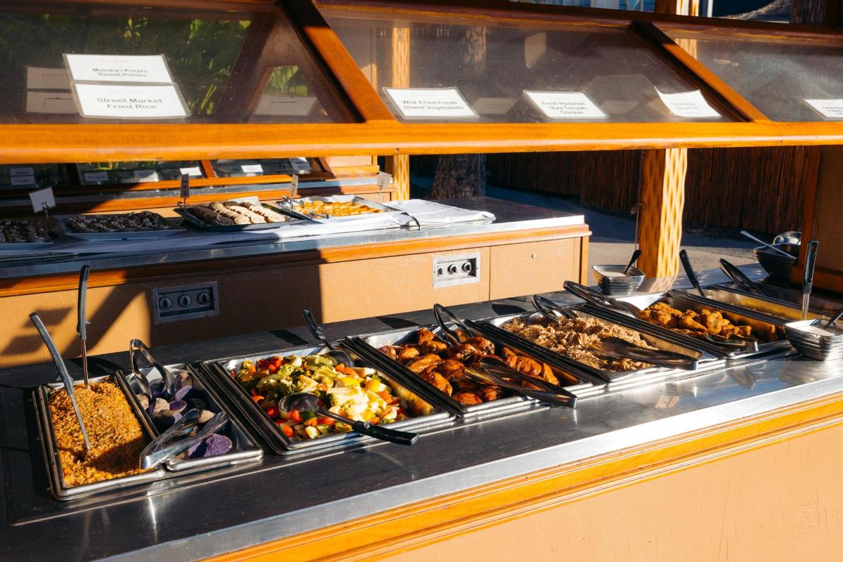 a buffet with many different types of food on