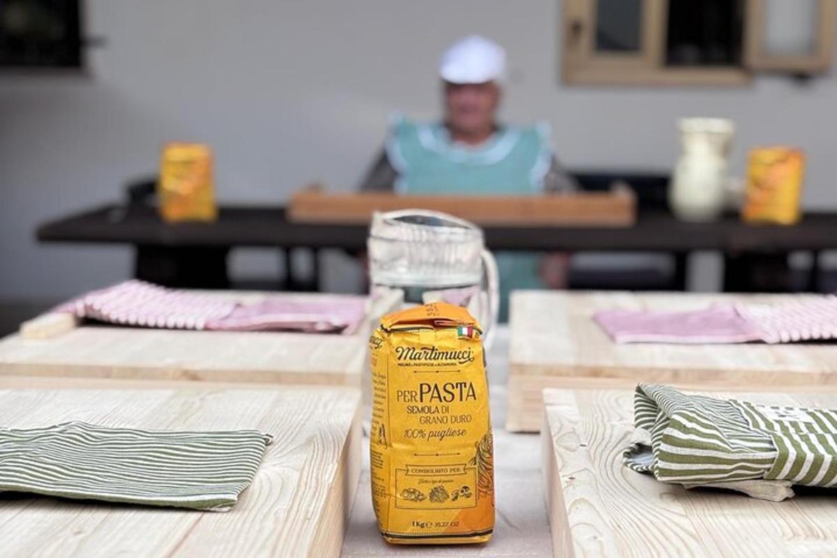 a bottle of pasta sitting on top of a wooden table