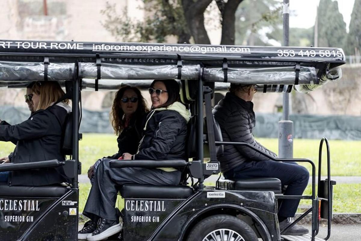 a group of people riding on a golf cart