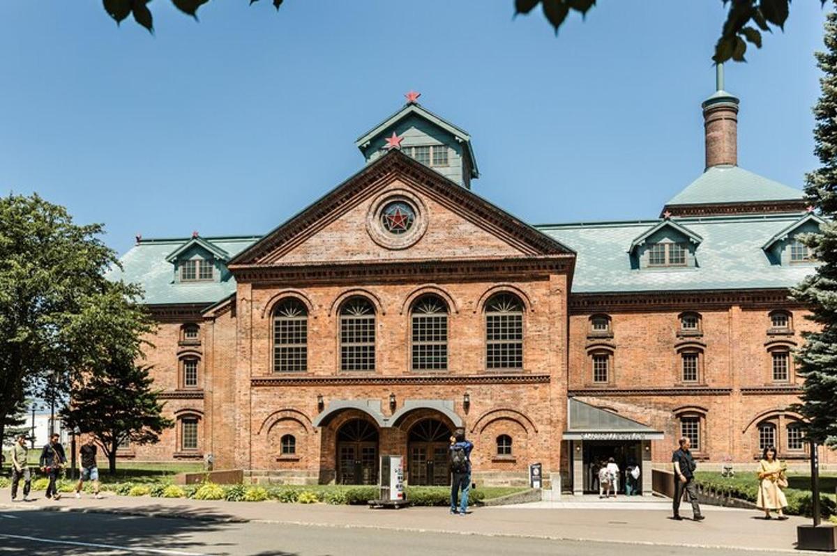 a large brick building with a clock on the front