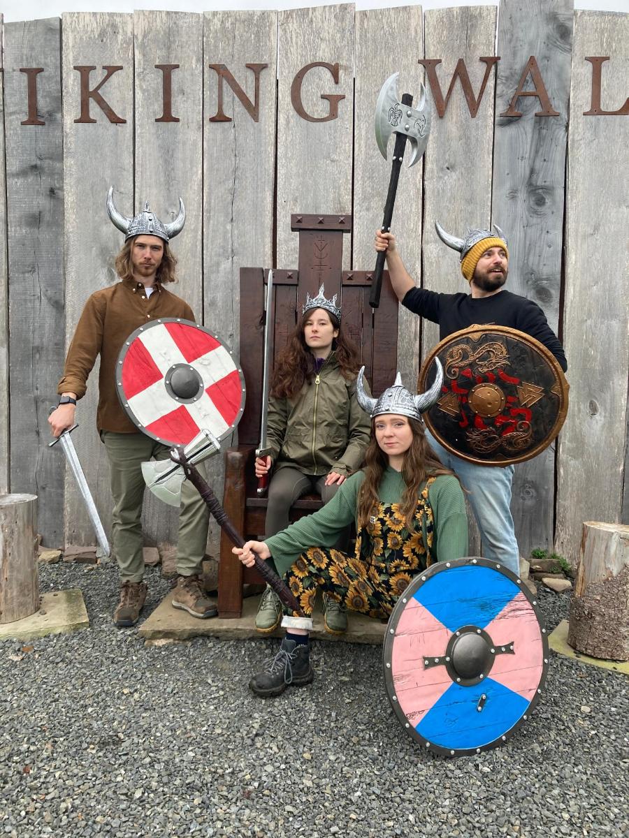 a group of people dressed up in antlers and costumes