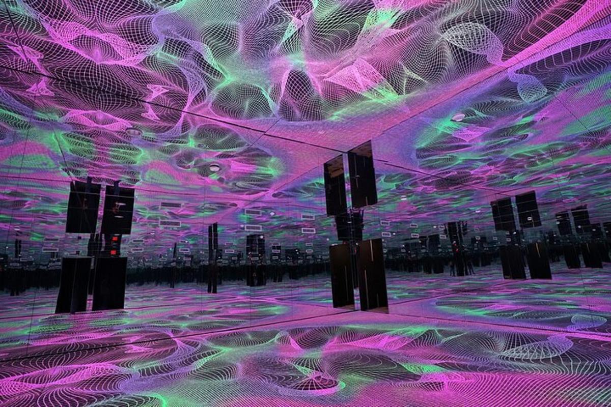 a room with purple and green lights on the ceilings