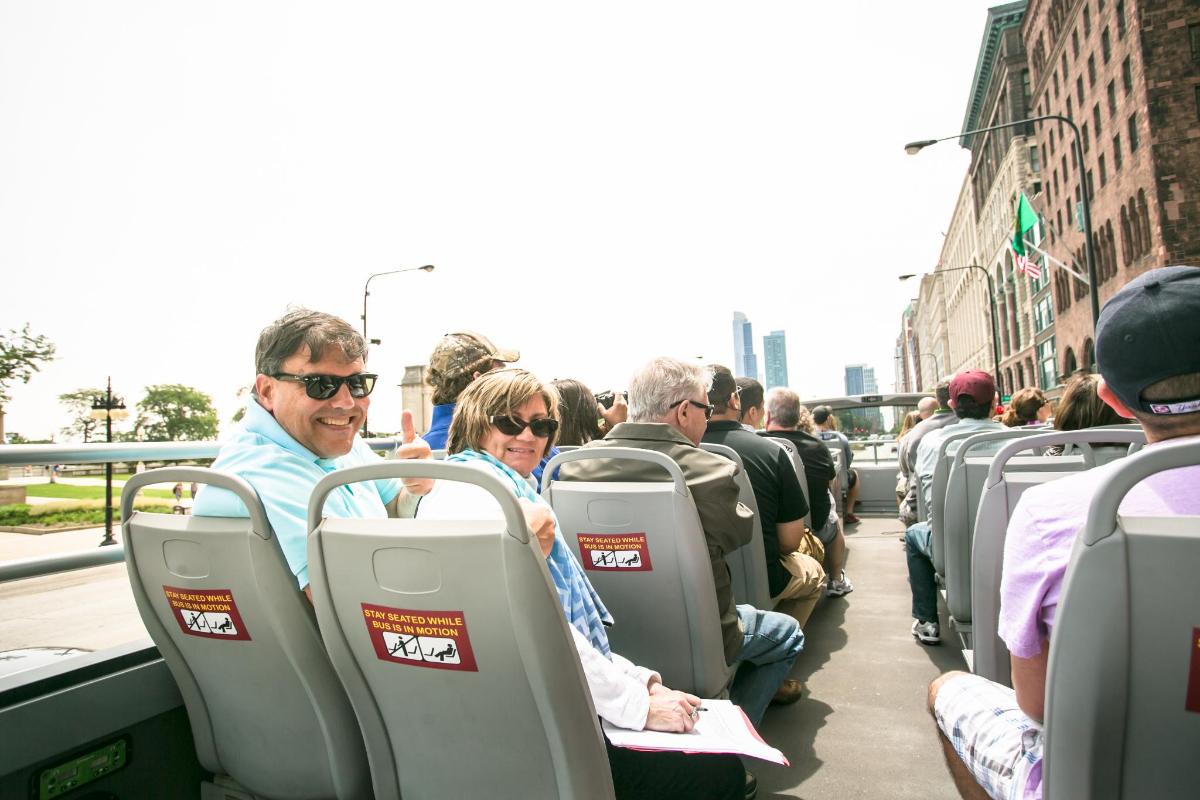 a group of people sitting on a bus