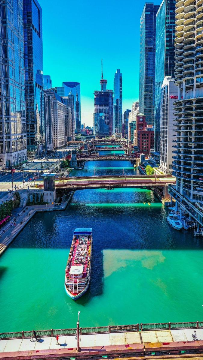 a boat in a river in a city