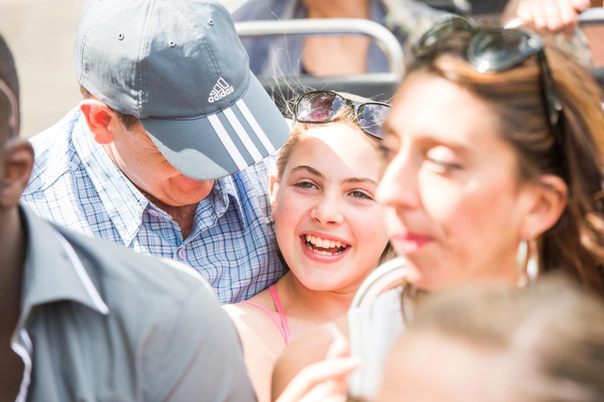 a group of people sitting around each other