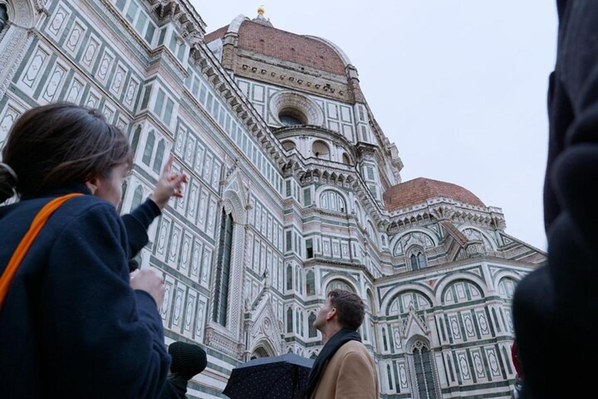 a group of people standing in front of a building