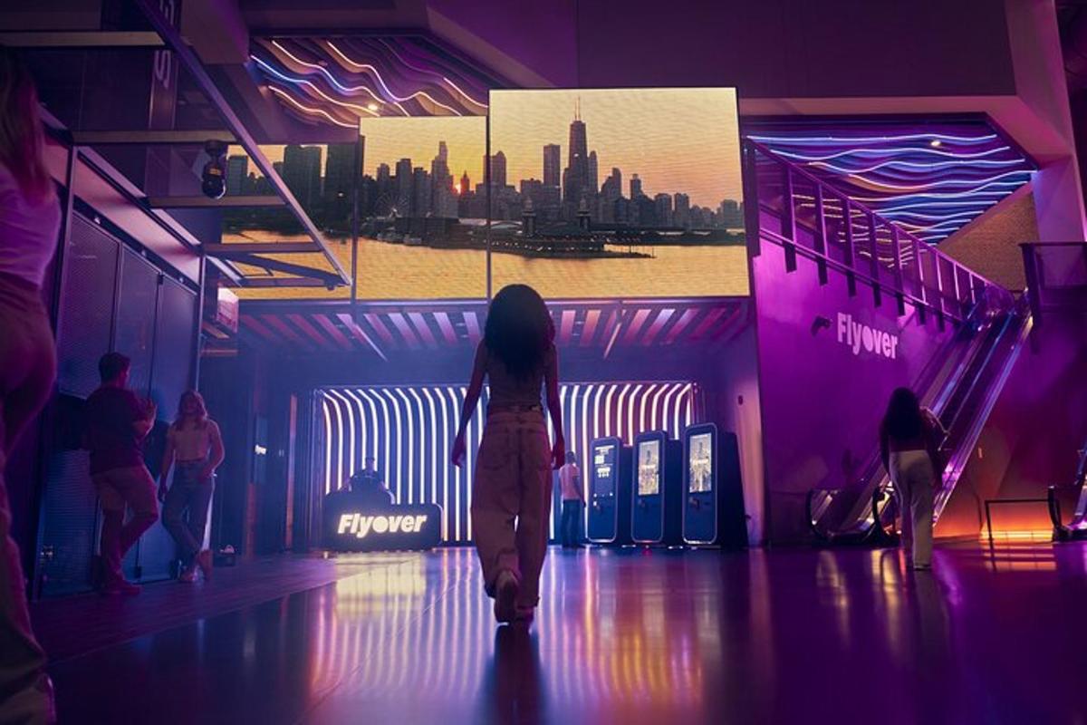 a woman walking down a hallway in a building