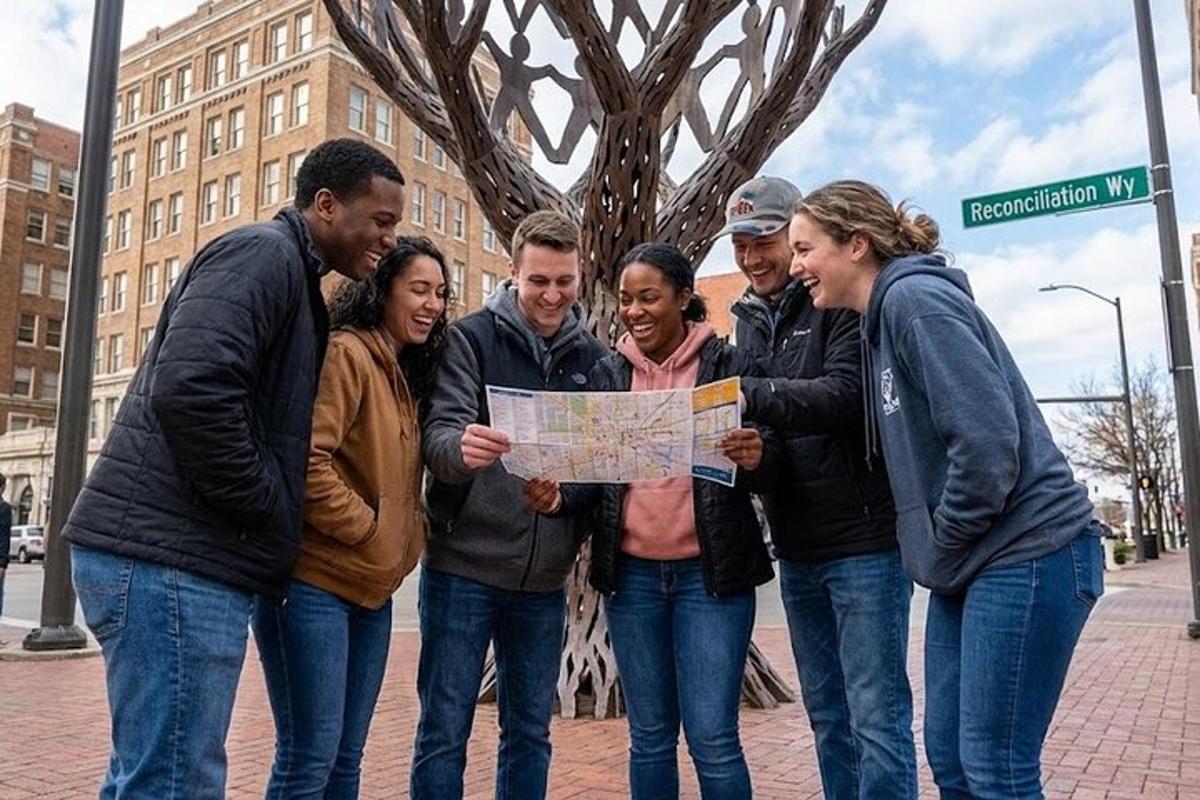 a group of people looking at a map
