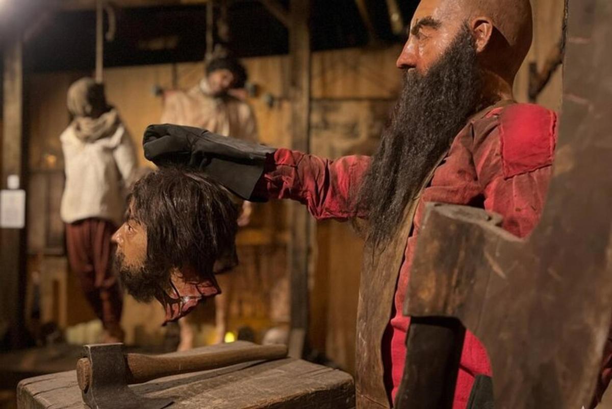a man cutting another mans hair in a barber shop