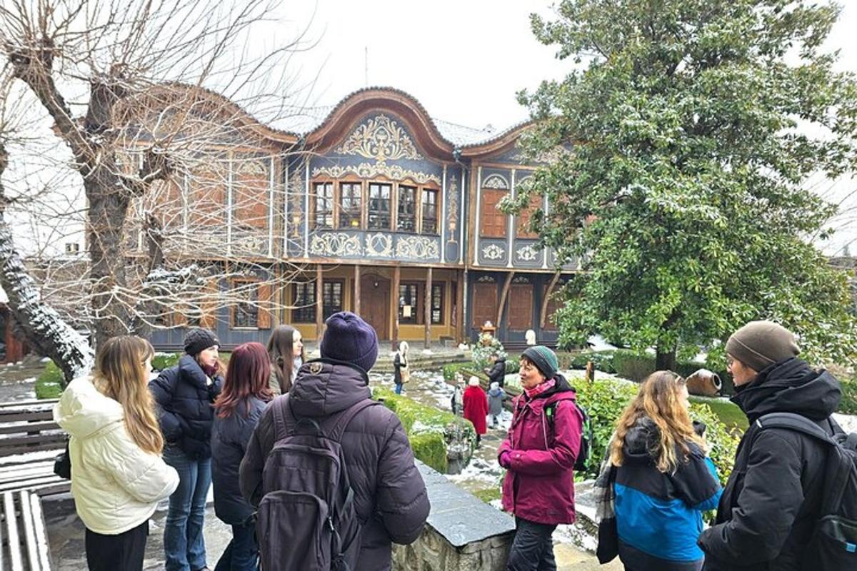 a group of people standing in front of a building