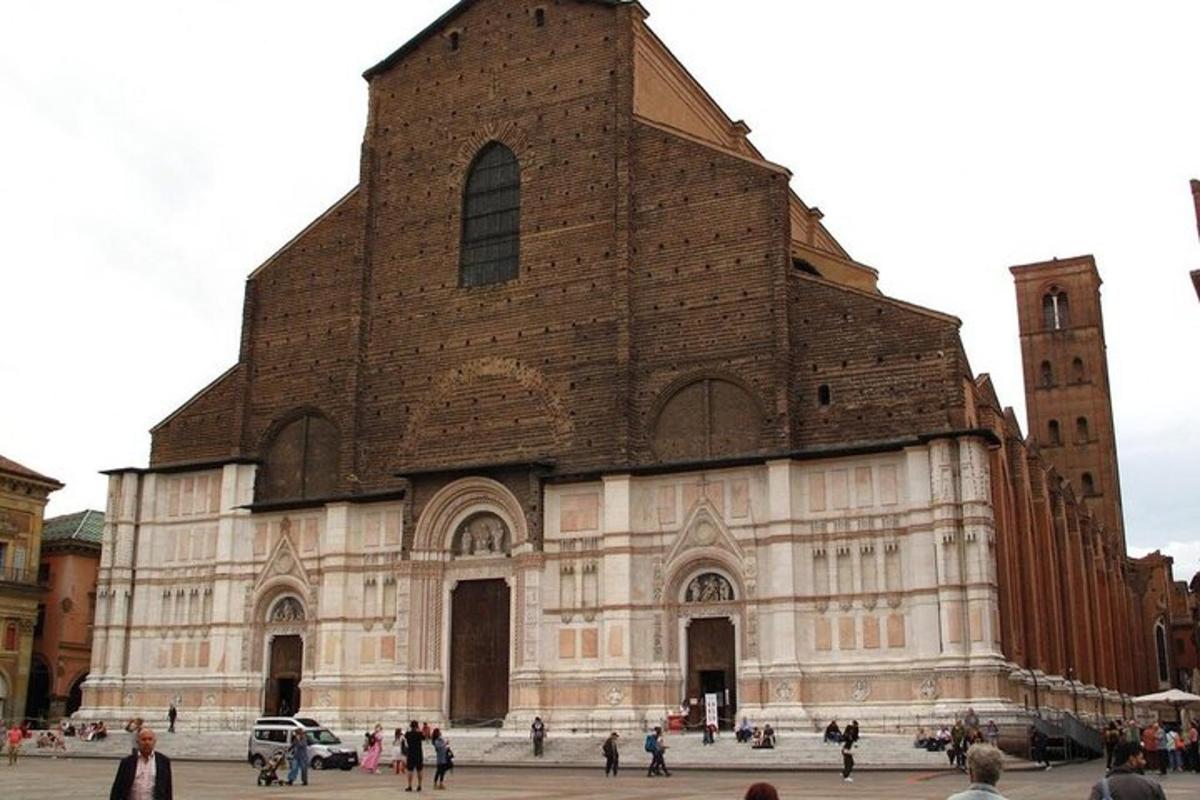 a large church with people standing in front of it