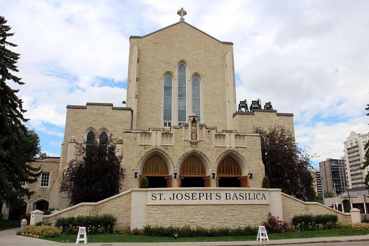 a church with a tower with a sign in front