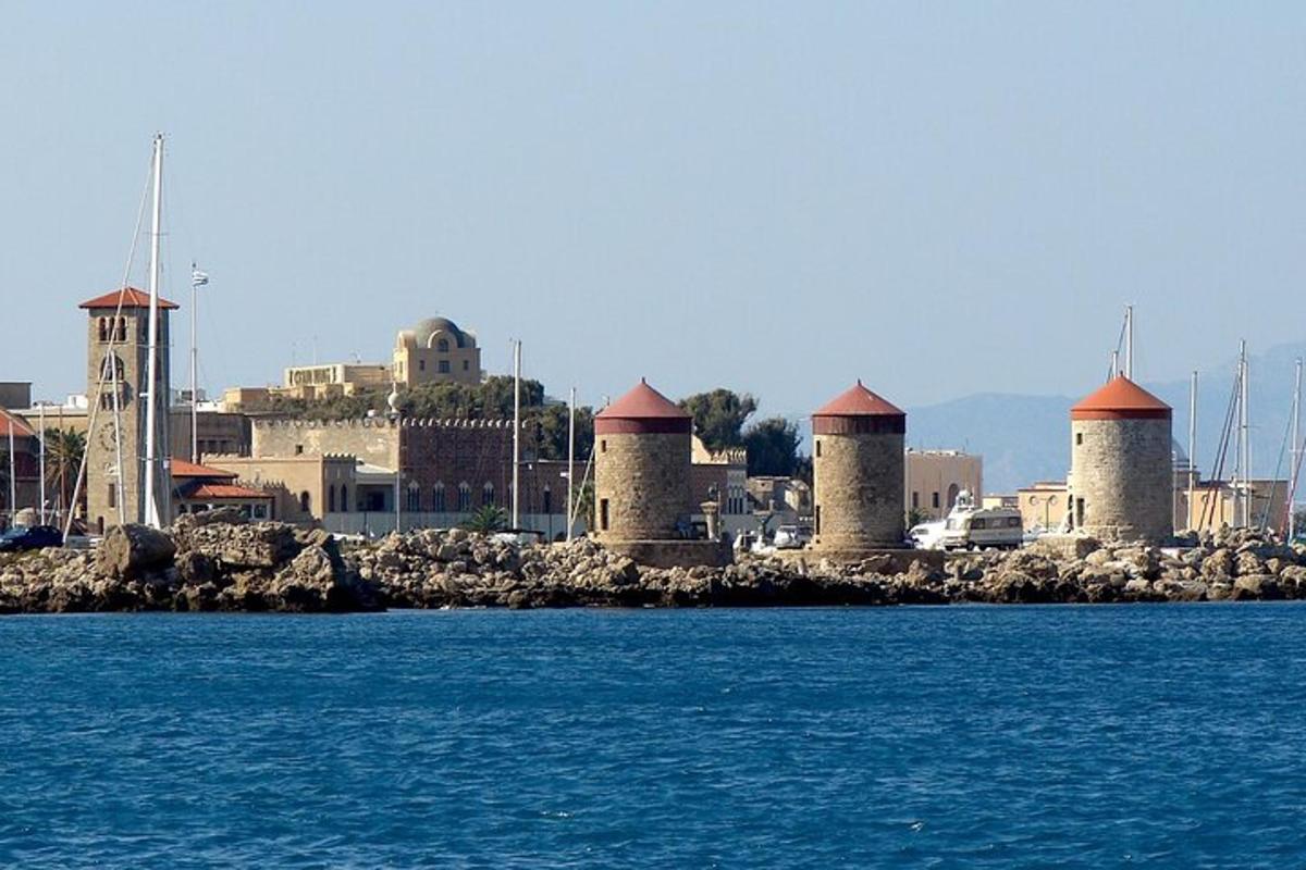a group of buildings on a island in the water