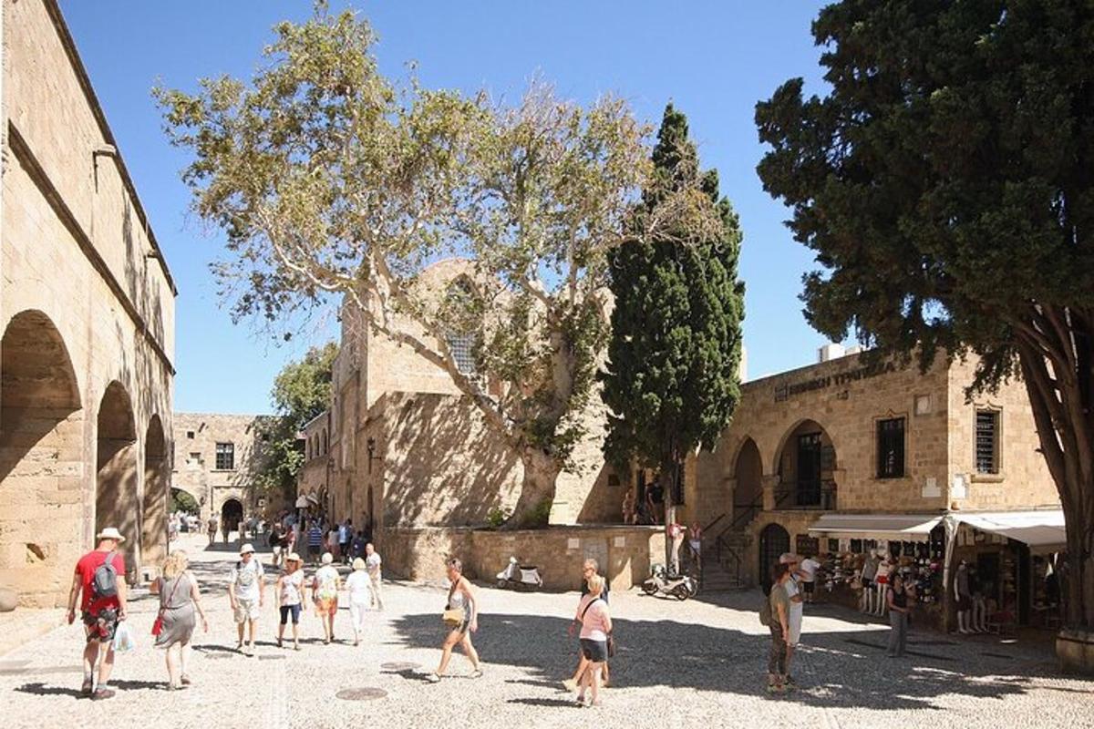 a group of people walking around in a street