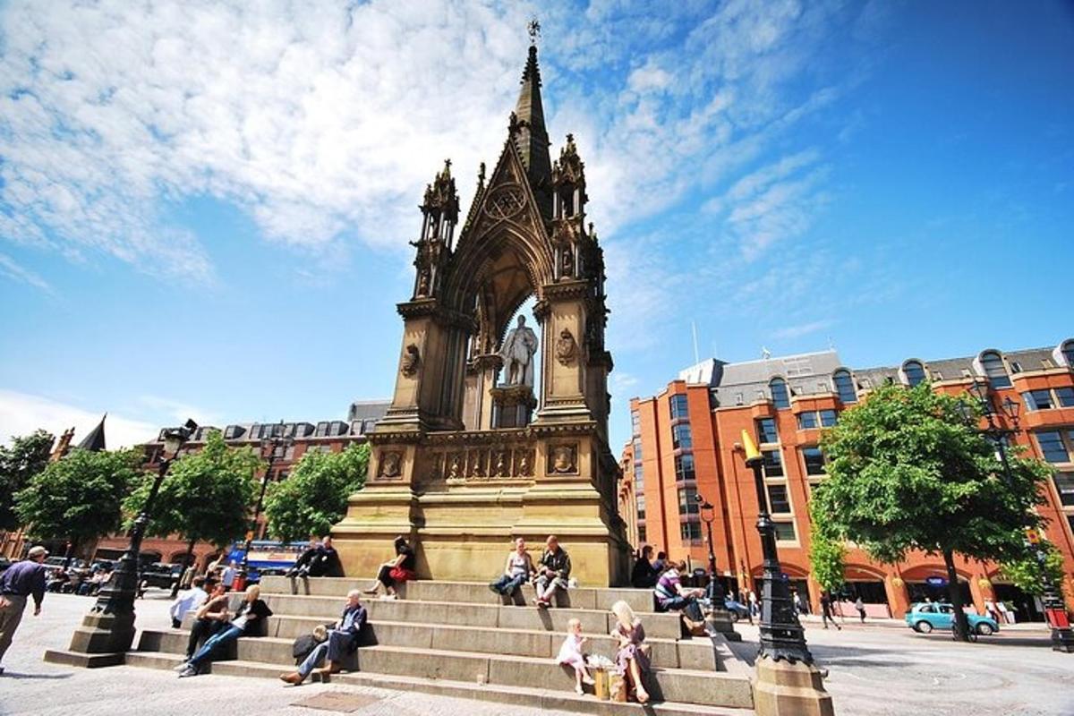 a clock tower sitting on top of some stairs