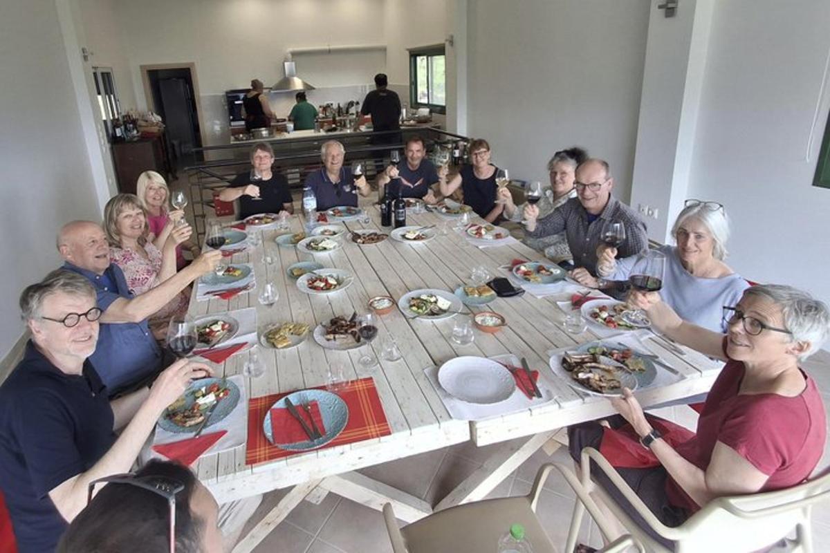 a group of people sitting around a table eating food