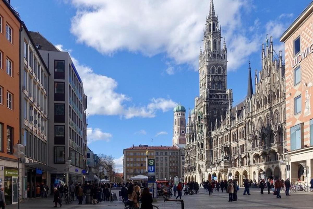 a busy city street with a clock tower