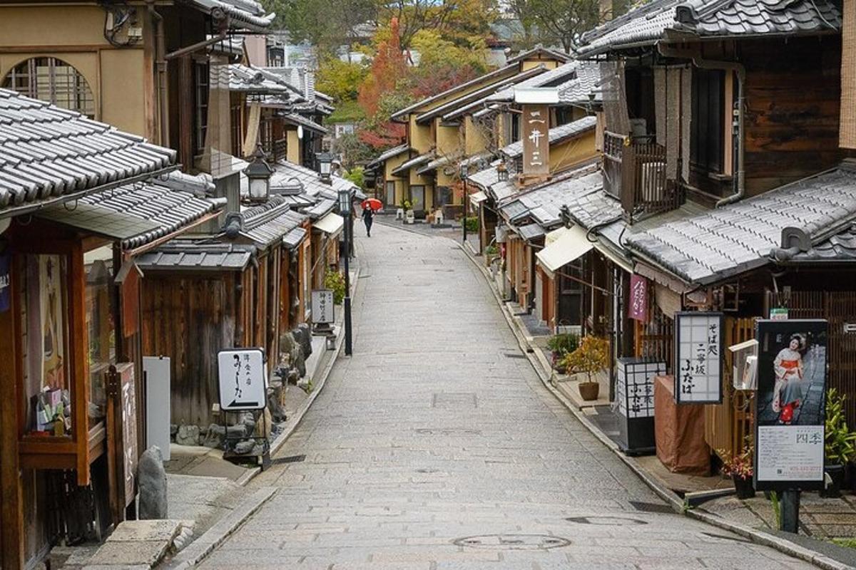 a street in an asian town with many shops