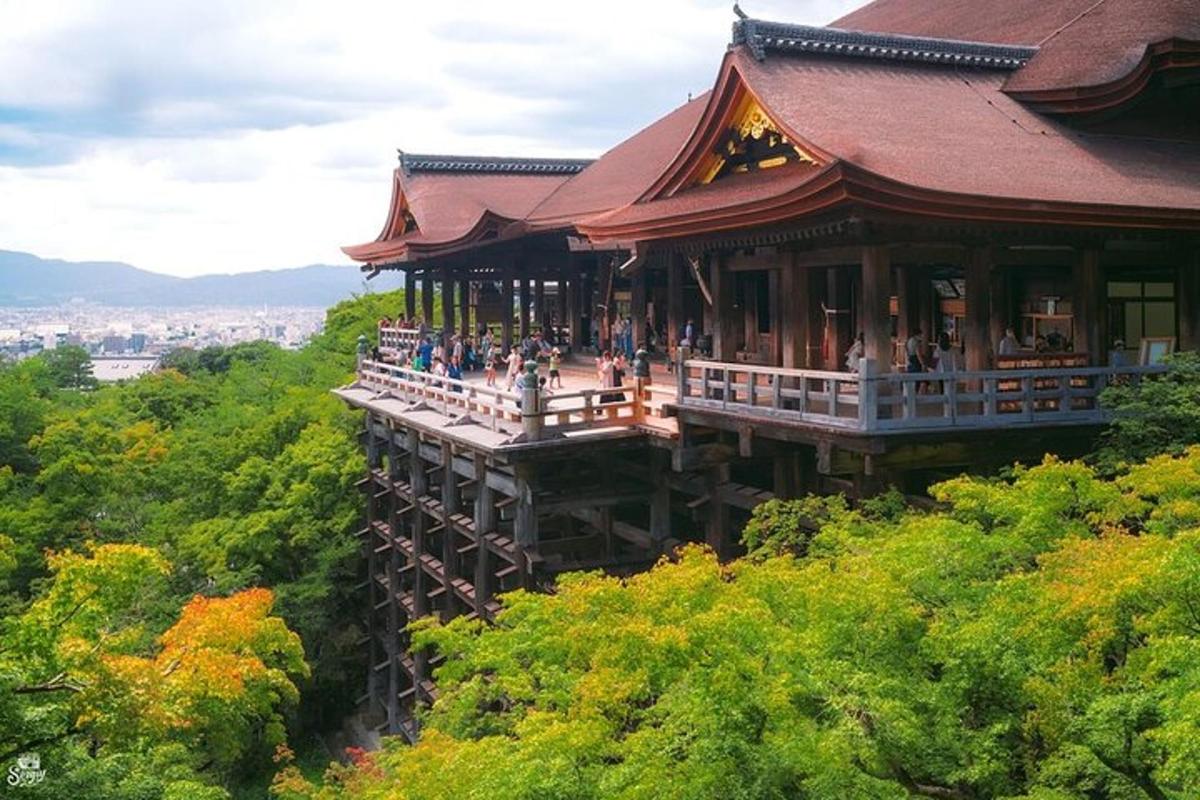 a building on a hill with people standing in it